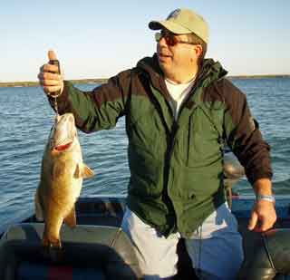 cameraguy weighs his 6.5 pound giant Mullett Lake smallie October 9 2008 cameraguy weighs his 6.5 pound giant Mullett Lake smallie October 9 2008