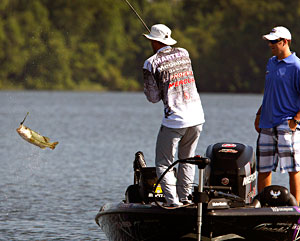 Aaron Martens, flipping a bass into the boat on Wheeler Lake, will also compete in the Ragnar Relay Series Aaron Martens, flipping a bass into the boat on Wheeler Lake, will also compete in the Ragnar Relay Series