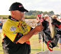 Mickey Thomas weighs in fish during the B.A.S.S. Southern Open on Alabama’s Wheeler Lake.
