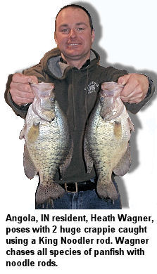 Angola, IN resident, Heath Wagner, poses with 2 huge crappie caught using a King Noodler rod. Wagner chases all species of panfish with noodle rods.