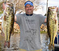 Day-one leader Chad Prough holds up part of his 35-pound, 3-ounce stringer