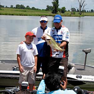 Elite angler Russ Lane fished with CWO4 John Lightsey and they caught this nice largemouth bass during the 2010 event Elite angler Russ Lane fished with CWO4 John Lightsey and they caught this nice largemouth bass during the 2010 event