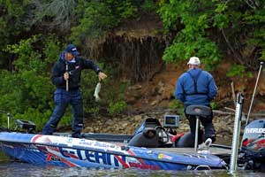 David Walker flips a West Point Lake largemouth bass into the boat on day one of the Pride of Georgia Elite Series event David Walker flips a West Point Lake largemouth bass into the boat on day one of the Pride of Georgia Elite Series event