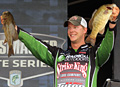 Smallmouth bass like these two professional bass angler Jonathon VanDam hold should be abundant and large when the 2013 Bassmaster Elites Series makes their first visit ever to Michigans Lake St. Clair.  Photo Credit: B.A.S.S.