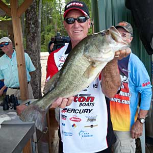 Bassmaster Guy Eaker with one of the big largemouth bass that helped Ken Cook and him win the All-Star Week Legends tournament Bassmaster Guy Eaker with one of the big largemouth bass that helped Ken Cook and him win the All-Star Week Legends tournament