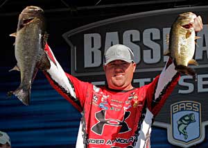 Elite angler Jason Williamson with two big Florida largemouth bass from the 2011 St. Johns River Power-Pole Citrus Slam evens Elite angler Jason Williamson with two big Florida largemouth bass from the 2011 St. Johns River Power-Pole Citrus Slam event