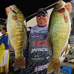Phoenix Arizona bass pro John Murray shows off two big smallmouth bass from the 2008 Empire Chase Elite Series event Phoenix Arizona bass pro John Murray shows off two big smallmouth bass from the 2008 Empire Chase Elite Series event
