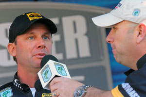 Kevin Vandam is in 2nd place 8 pounds behind leader Shaw Grigsby at the Elite Series Sunshine Showdown on the Harris Chain, here talking to emcee Dave Mercer Kevin Vandam is in 2nd place 8 pounds behind leader Shaw Grigsby at the Elite Series Sunshine Showdown on the Harris Chain, here talking to emcee Dave Mercer