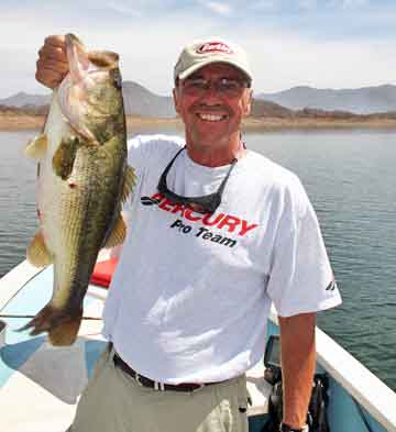 In the spring of 2008 Louie Stout visited Lake Mateos in Mexico and landed this  6-12 largemouth. Lake Mateos is a relatively new destination for bass fishing in Mexico. He was a guest of Berkley along with a group of other writes for Bassmaster magazine. This fish was the 2nd largest the group caught that week. He caught it on a 10-inch Power Worm.