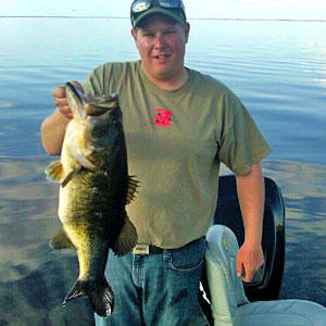 Michigan bass pro Luke Gritter is in 8th place 
going into the final day of the 2012 Bassmaster Southern Open on Florida's Harris Chain. This is an 11 pound largemouth bass Luke caught on a 
Garneau Baits 4.2 GenX bug in practice last season