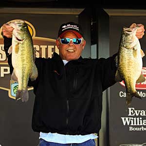 St. Louis bass pro Mark Tucker weighed in 16 pounds 10 ounces on day 1 to lead the BASS Central Open on Lewisville Lake St. Louis bass pro Mark Tucker weighed in 16 pounds 10 ounces on day 1 to lead the BASS Central Open on Lewisville Lake