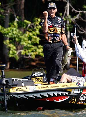 Professional angler Michael Iaconelli pumps his fist in the air after landing another nice bass during a 2011 Elite Series event Professional angler Michael Iaconelli pumps his fist in the air after landing another nice bass during a 2011 Elite Series event