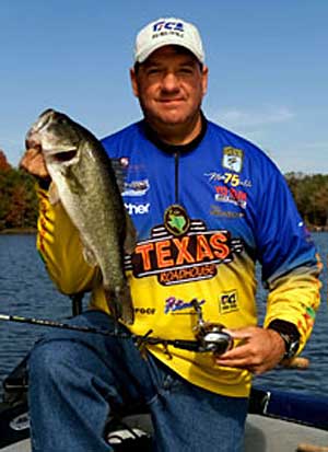 Roadhouse Tackle pro Mike DelVisco of South Carolina shows off a nice largemouth bass Roadhouse Tackle pro Mike DelVisco of South Carolina shows off a nice largemouth bass