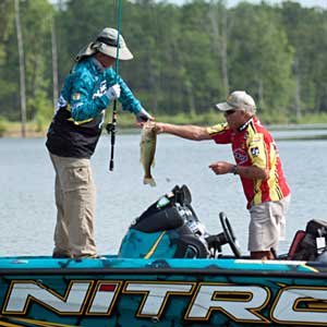 Bassmaster Rick Clunn fished with Tommy Martin during the All-Star Week Legends tournament Bassmaster Rick Clunn fished with Tommy Martin during the All-Star Week Legends tournament
