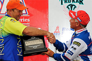 Steve Kennedy receives the champion's trophy from PAA President Dave Mansue after winning the Bass Pro Shops PAA Tournament Series event on Neely Henry Lake with a three-day total of 38.12 pounds Steve Kennedy receives the champion's trophy from PAA President Dave Mansue after winning the Bass Pro Shops PAA Tournament Series event on Neely Henry Lake with a three-day total of 38.12 pounds