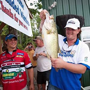 LCpl Travis Johnson USMC Retired lands an 8 pounds largemouth bass while fishing with Elite Angler Keith Poche during the 2011 Hope for the Warriors tournament LCpl Travis Johnson USMC Retired lands an 8 pounds largemouth bass while fishing with Elite Angler Keith Poche during the 2011 Hope for the Warriors tournament