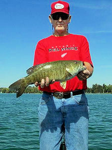 Larry with the first big smallie of our trip