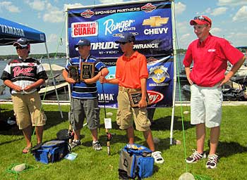 2008 champs bracketed by our 2007 past champs - Dougie Phillips on the far left and Cody Harris on the far right - includes some of the free gear the 2008 champs received