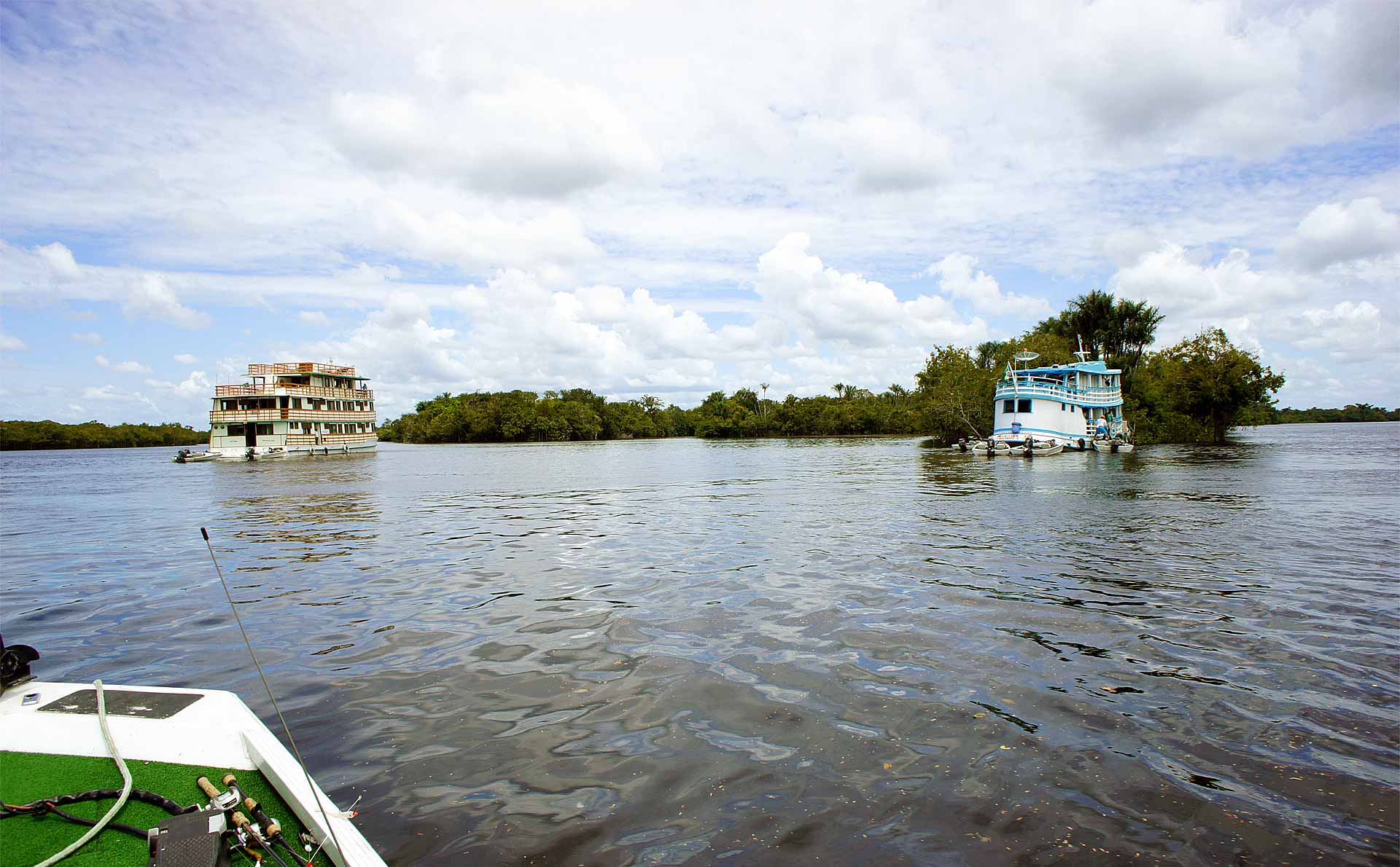 Amazon Otter and the guides houseboat on the Rio Negro 2012-dsc00862