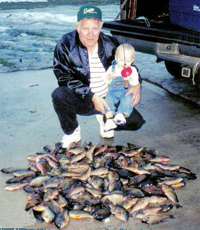 Leonard Myers with a mess of ice fishing panfish