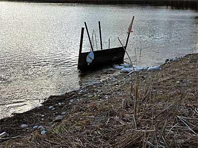 The outflow of the Upper Crooked Lake to Lower Crooked Lake weir off Parker Road in Barry County, Michigan.
