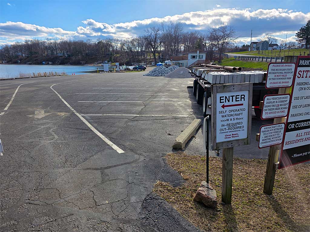 Boat ramp repair materials piles up unused so far at the Upper Crooked Lake boat ramp in Barry County, Michigan.
