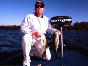 Derek with a pair of jig and pig largemouth from one of our few local lakes - Lake Lansing.