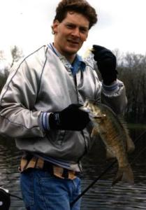 Dan with a pretty Baseline Lake smallmouth that bit a tube off a breakline.