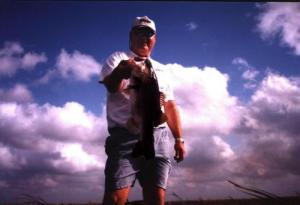 Florida fishing friend Jon Peters with a huge Okeechobee largemouth caught on a bright but incredibly windy fishing day in February 02.