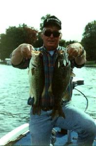 For those who like variety, common on many Michigan lakes is the chance to catch both nice largemouths & smallmouths like these Gull Lake beauties Larry caught on a spinnerbait.