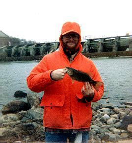 Interesting about this old photo of me in my ‘Fudd’ outfit, I was cranking the Grand for salmon on a snowy February 1 & started popping smallmouths despite conventional wisdom saying they should be ‘dormant.’