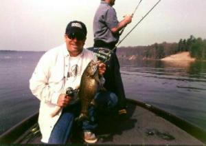 Mark boats a nice Hardy Dam Pond smallie from a spring 03 trip with Brian Spear and I. We caught a good bunch of nice bass including 1 solid largemouth.