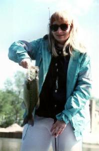 My wife Angie with a chunky largemouth from a Saginaw Bay canal.