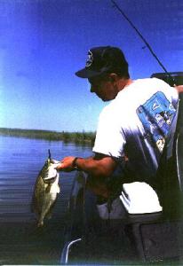 Derek lips a solid largemouth that ate a Texas-rigged power worm.