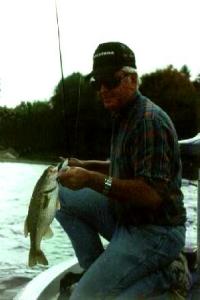 Larry with a decent Gull Lake largie that smacked a spinnerbait during a good fall outing.