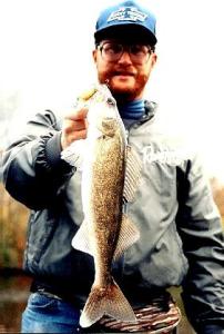 A Grand River walleye from the river-run backwater upstream of Lansing – back in my younger, full-beard days.