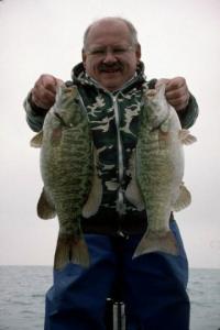 Len Sawisch with a late season double of fat St. Clair open-water smallmouths.