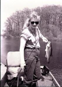My #1 wife, Angie can catch bass too. Here's one caught on a lizard expertly flipped into a bush and wrestled out.